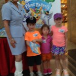 Sandy with kids at booksigning