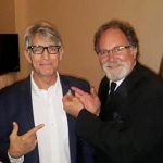 Actor Eric Roberts receives AAI lapel pin. 